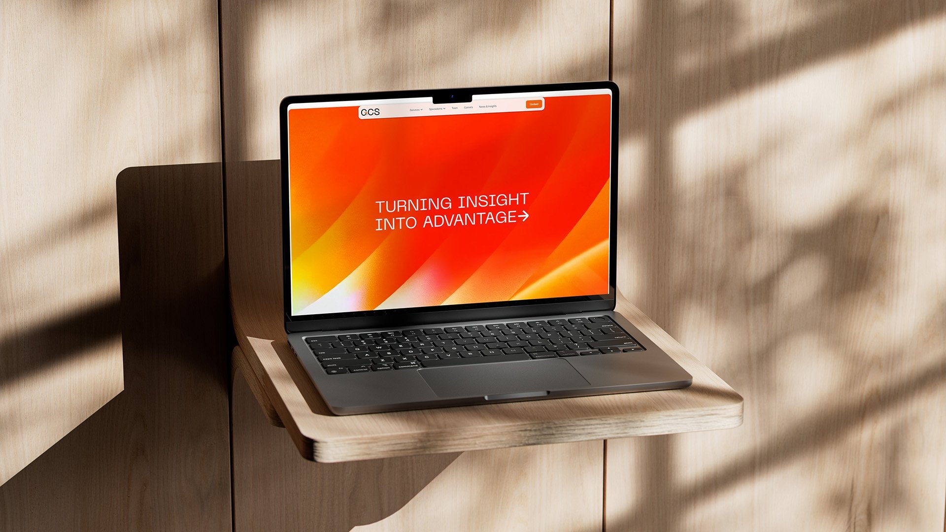 Website design for GCS Insight displayed on a laptop, showcasing the consultancy's new digital experience.